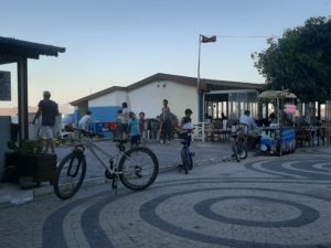 People out and about enjoying a balmy summer night in Yiğitler