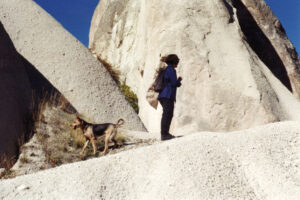 This was me with a random dog that followed us on our walks through the valleys in 1996.
